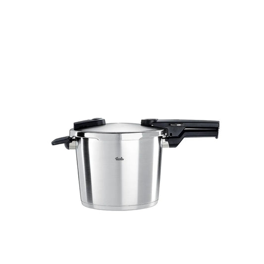 Stainless steel pressure cooker with black handles on a white background