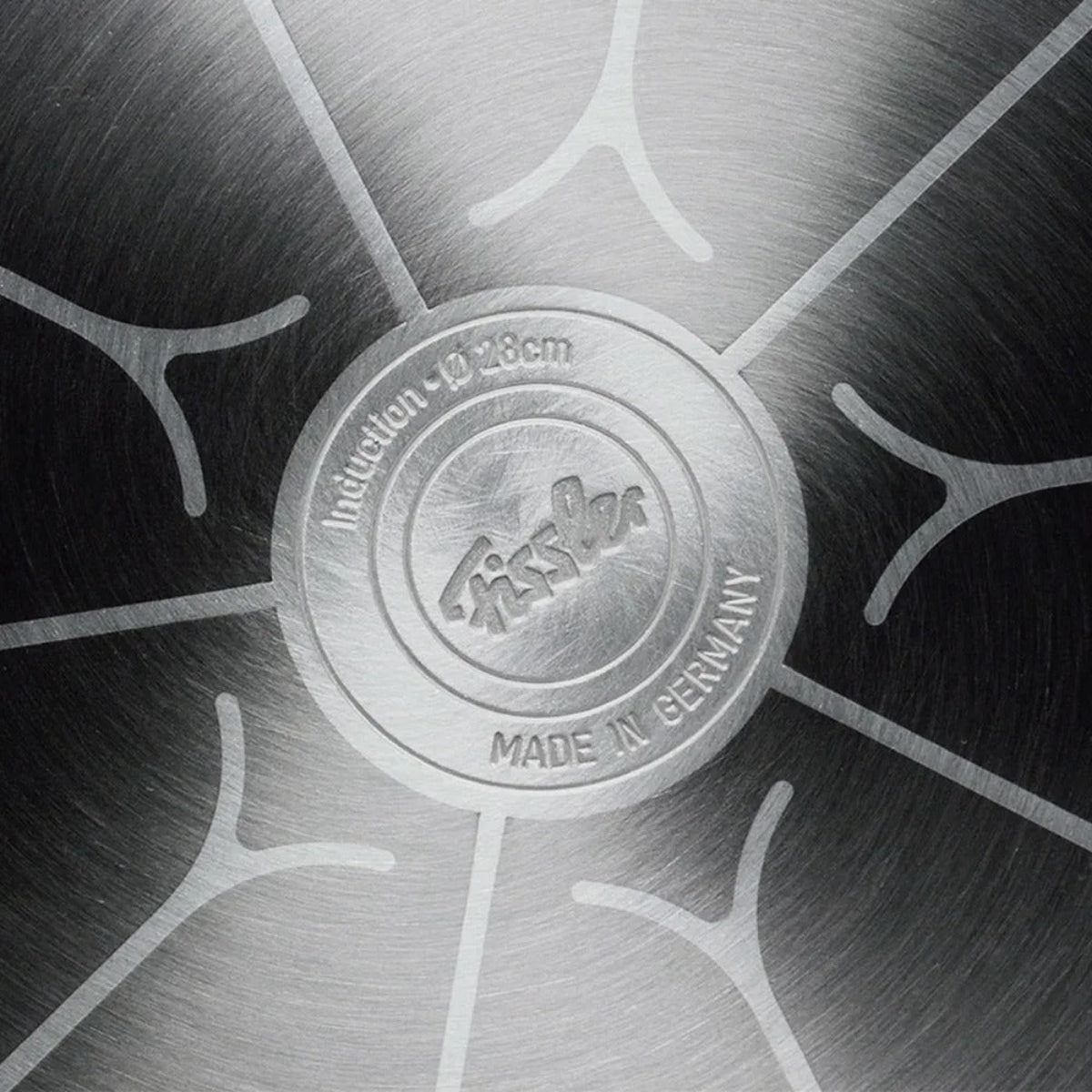 Close-up of a metal cutting board with Wissler branding and 'Made in Germany' text.