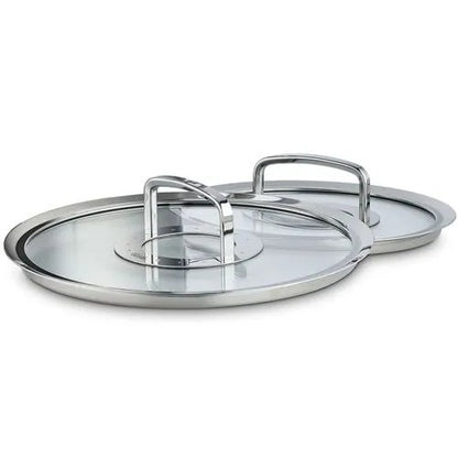 Stainless steel lid with handles on a white background