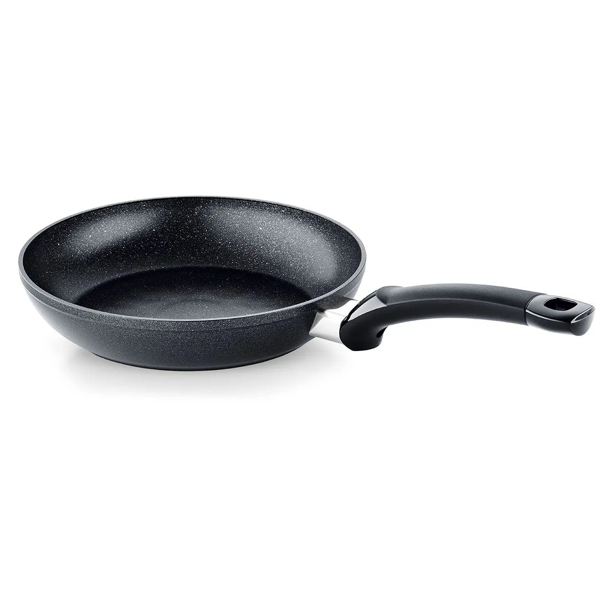 Black frying pan with speckled surface on a white background