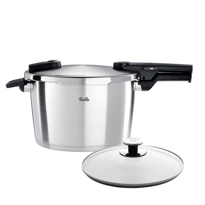 Stainless steel pressure cooker with lid on a white background